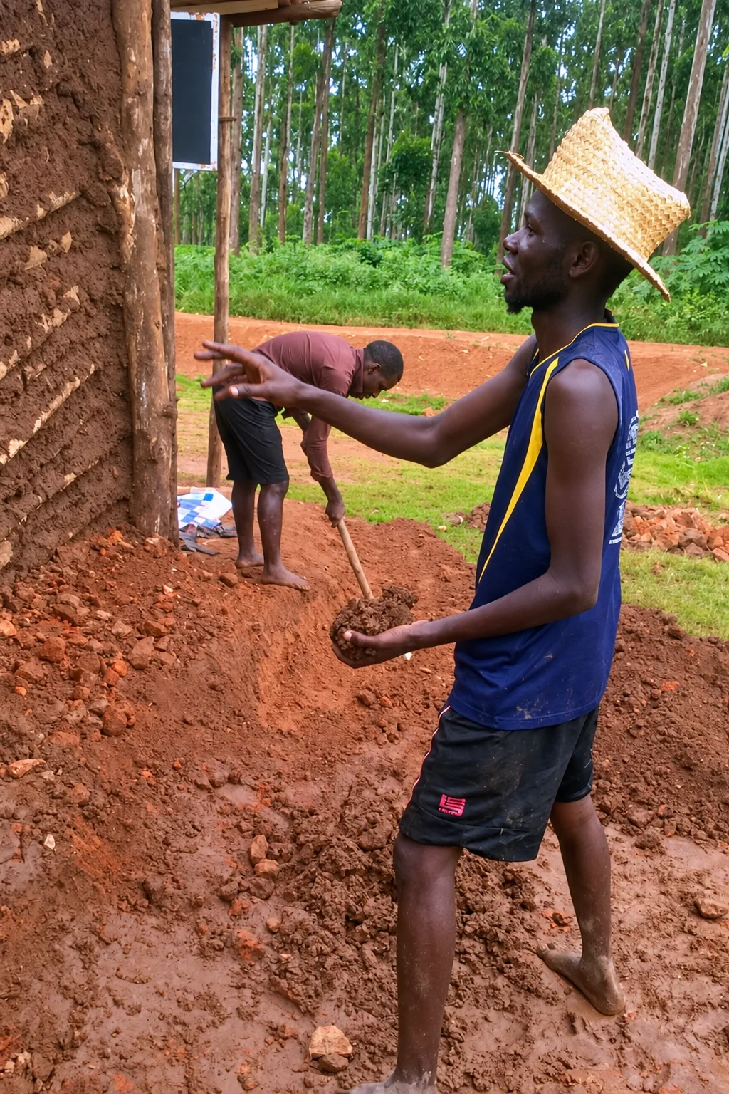 Working on the walls of a community building